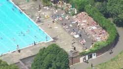 UK Heatwave - Aerials People trying to stay cool in London News Clip