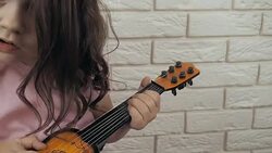 Children playing the guitar. Stock Footage