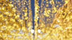 Bright Christmas Street Illumination. The City is Decorated for the Christmastide Holiday. New Year Lights Decorating Shimmering bokeh Stock Footage