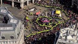 Aerials of police surrounding the pink Extinction Rebellion yacht News Clip