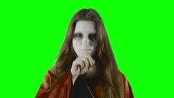 Be warned! - teenage girl, disguised for Halloween or a costume party, against a green screen Stock Footage