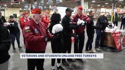 Veterans, college students help unload Thanksgiving turkey donations News Clip