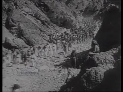 T. E. Lawrence with Allenby, Arab Revolt, Turkish troops, troops on camels crossing desert, c1917 Stock Footage