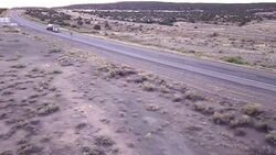 Aerial Drone Footage of Semi-Trucks Rolling Down the Highway Stock Footage