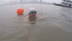 CLEAN : Inspired by Mao, Wuhan river swimmers 'reborn' after virus lockdown News Clip