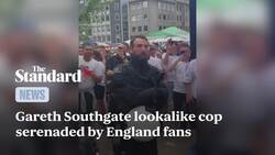 Gareth Southgate lookalike cop serenaded by England fans Instructional Video
