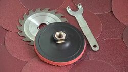 Rotating sanding discs and other grinder tool equipment background Stock Footage