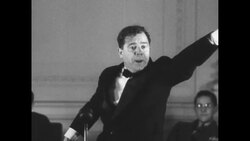 Profile of politician Huey Long with headlines and man on street comments, 1935 News Clip