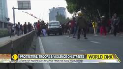 Indonesia: Violence spreads across streets amid clashes between troops and protesters News Clip