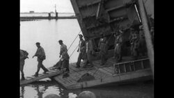 Released Chinese Communist POWs boarding train in port of Inchon following truce between UN and North Korea ending Korean War News Clip