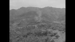 South Korean soldiers take positions and open fire on enemy territory during the Korean War News Clip
