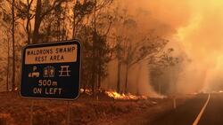 Wildfire burns next to major highway in Australia Instructional Video