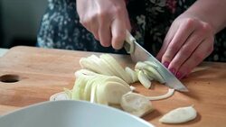 Woman cutting onion Stock Footage