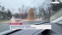 Water main break in Berkeley Heights sends water shooting above traffic lights News Clip