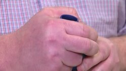 Scientist holding a nebuliser containing prototype coronavirus treatment News Clip