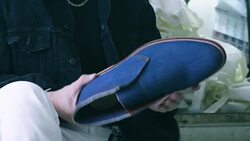 Shoemaker hands at work Stock Footage