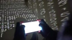 4K Hacker Writing On Smartphone In Flow Of Numbers Code Stock Footage