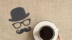 Male silhouette pattern with mustache, glasses and hat with cup of coffee on the burlap background. Movember concept. Prostate Cancer and men's health awareness Stock Footage