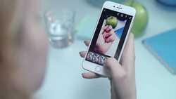 Woman check mobile filter for instagram photo. Instagram hands photo Stock Footage