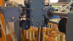 operation of the machine for weaving ribbons Stock Footage