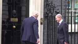 German Chancellor arrives in Downing Street News Clip