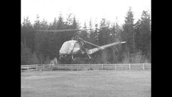 Emergency vehicles and workers; chartered plane carrying soldiers crash site in forest in Cascade Mountains News Clip