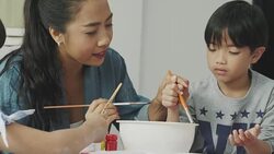 Enthusiastic teacher helping her students at art class Stock Footage