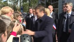 CLEAN : Macron, wife Brigitte arrive to vote in first round of presidential election News Clip