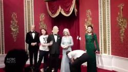 Climate activists cover wax figure of King Charles in cake News Clip