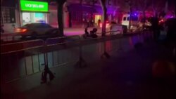 CLEAN : China: Police presence, workers install barricades in Shanghai after protests News Clip