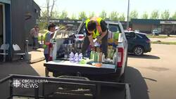 Wildfire smoke spreads as Alberta community evacuates, again Instructional Video