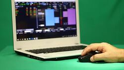 Using laptop trading stock exchange Stock Footage