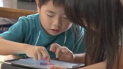 Tiny fingers tap into digital age in Japan News Clip