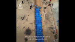 More than 100 people buried in mass grave in Khan Younis News Clip