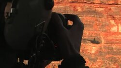 Man photographing the Bungle Bungle Range from a helicopter, Australia. Editorial Use Only. Stock Footage