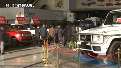 China announces it will slash tariffs on car imports News Clip