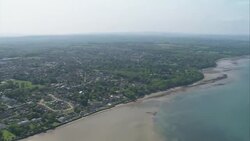 Aerial view over the coastline of Isle of Wight News Clip
