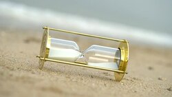 4k Sand clock on the beach, business concept teamwork & time management Stock Footage