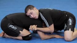 How to Do an Anaconda Choke or Gator Roll MMA Submission Instructional Video