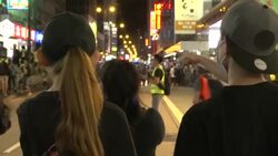 Hong Kong riot police seen from front line of protesters News Clip