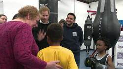 Harry high-fives young boxers on gym visit with Megan Instructional Video