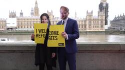 Boris Johnson and Priti Patel lookalikes tear up 'Refugees Welcome' signs News Clip