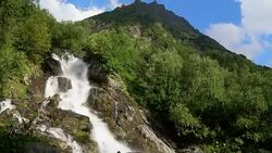 View waterfall scenes in mountains, national park Dombai, Caucasus, Russia Stock Footage