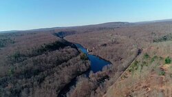 Aerial view of Pocono Mountains, Appalachian, in late fall sunny day. The Hickory River Stock Footage
