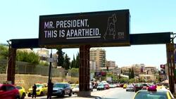 CLEAN : In Bethlehem, rights group's billboards say Israel is "apartheid" ahead of Biden visit News Clip