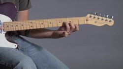 How to Play a B Minor Barre Chord on Guitar Instructional Video