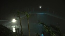 Hurricane Wind And Rain Batter Hotel Resort At Night Stock Footage