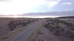 Aerial Drone Footage of Semi-Trucks Rolling Down the Highway Stock Footage