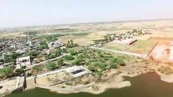 Empty field after wheat crop harvesting during summer season. Stock Footage