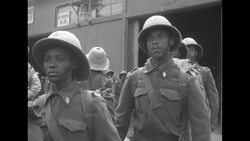 Ethiopian troops arrive in Pusan, South Korea to join UN forces; they travel to US infantry camp News Clip